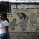 Exploited. An Oxfam sign in Corail, a camp for displaced people of the 2010 earthquake, on the outskirts of Port-au-Prince, Haiti.